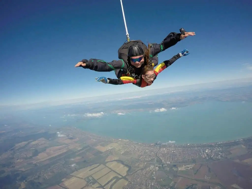 tandem jumping, you can see the Lake Balaton in the background
